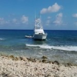 Boat runs aground on reef off Cayman Brac