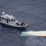 Police rescue two men from capsized boat