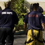 Ex-firefighter was on year-long paid leave in gun case