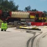 Brac fire officers flown to GCM after truck flips on runway