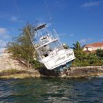 Captain crashes boat into ironshore