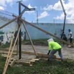 Teenage prisoners build their own basketball court
