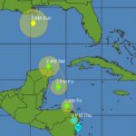 Depression emerges as TS Nate, heading NW