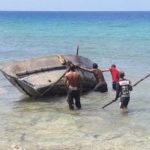 Cubans come ashore after six days at sea