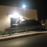 Driver smashes into airport building