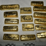 Broker charged in gold smuggling case