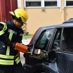 Dump truck crashes into car