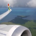 Cayman Airways turns back for sick passenger