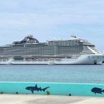 Mega cruise ship arrives with reduced passenger load