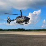 RCIPS chopper flies to TCI to tackle gang trouble