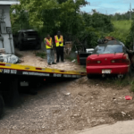 Driver critical following light-pole smash