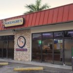 Armed suspect drops cash after robbing GT restaurant