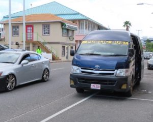 Public buses at George Town depot on Grand Cayman, Cayman News Service