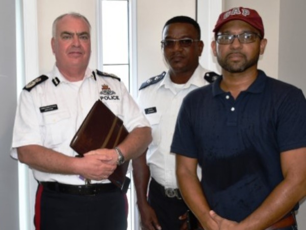 CoP Derek Byrne, Area Commander Inspector Lloyd Marriott and Wilson Mendoza, Cayman News Service