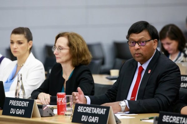 FATF President Raja Kumar of Singapore at Friday's plenary session, Cayman News Service