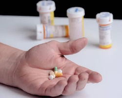 Three charged in prescription drug fraud case